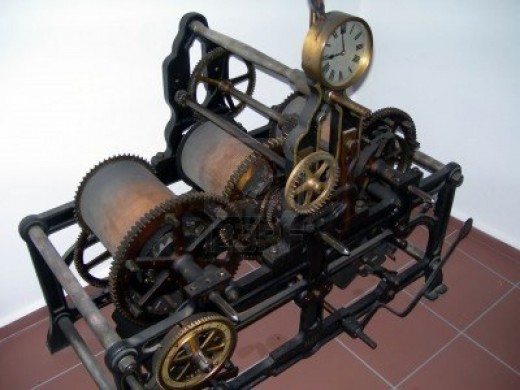 Ancient clock machine with sprockets