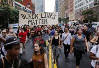 Thousands of New Yorkers Protest Police Shootings of Black Men